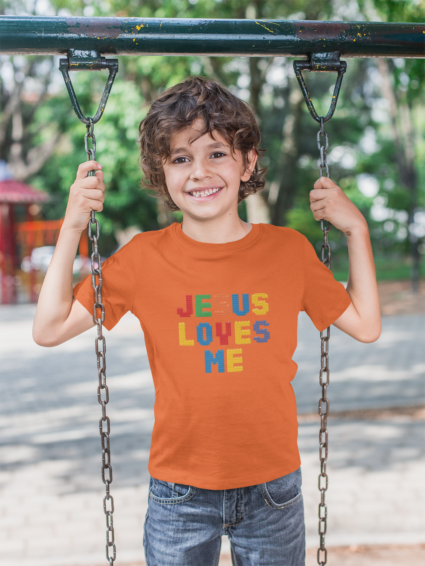 Kids T-Shirt — "Jesus Loves Me" Colorful Block Letter Tee